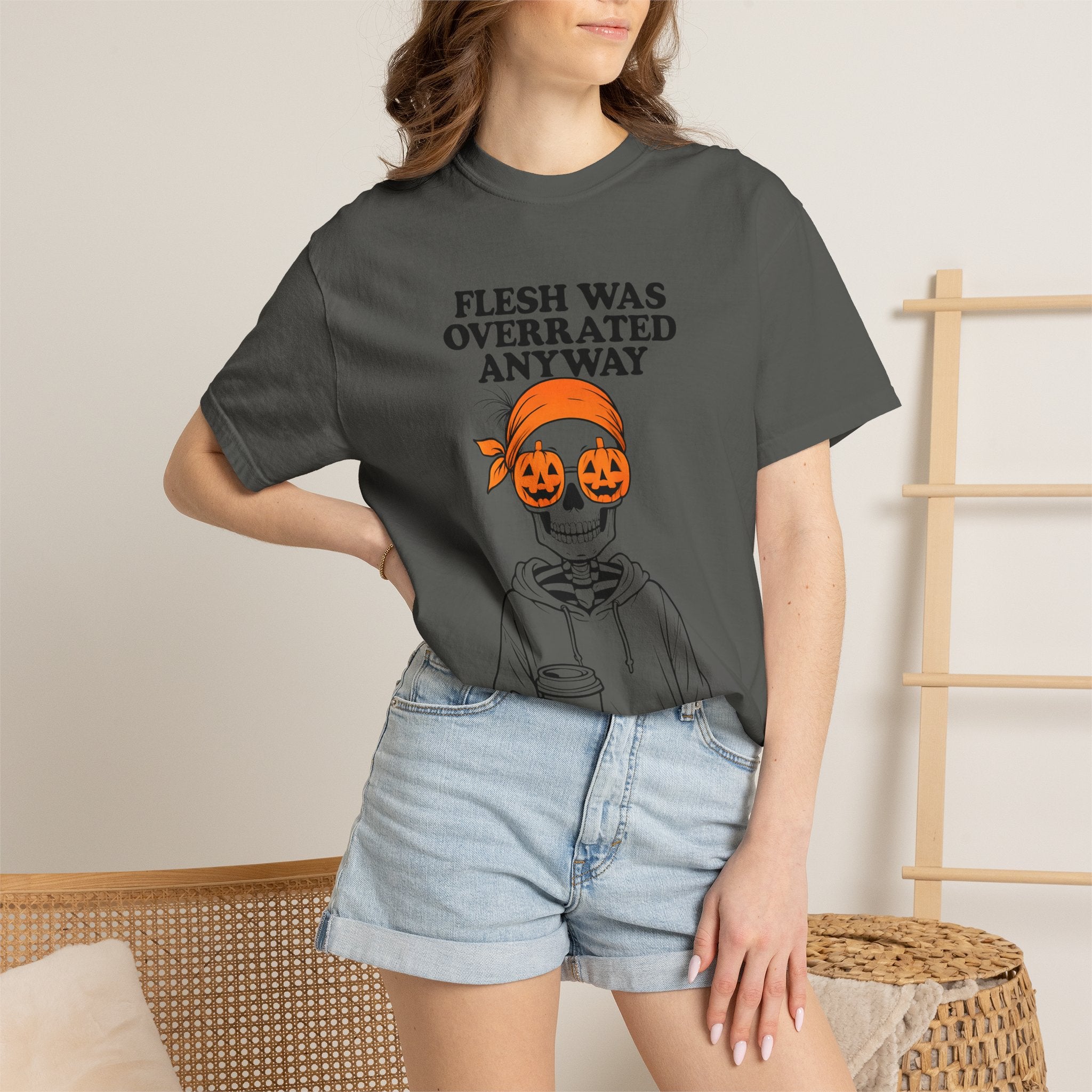 Dark gray Halloween graphic unisex tee with orange jack-o-lantern skull and skeleton print