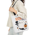 White canvas tote bag with black handles, ghost and orange '100% Boo' print