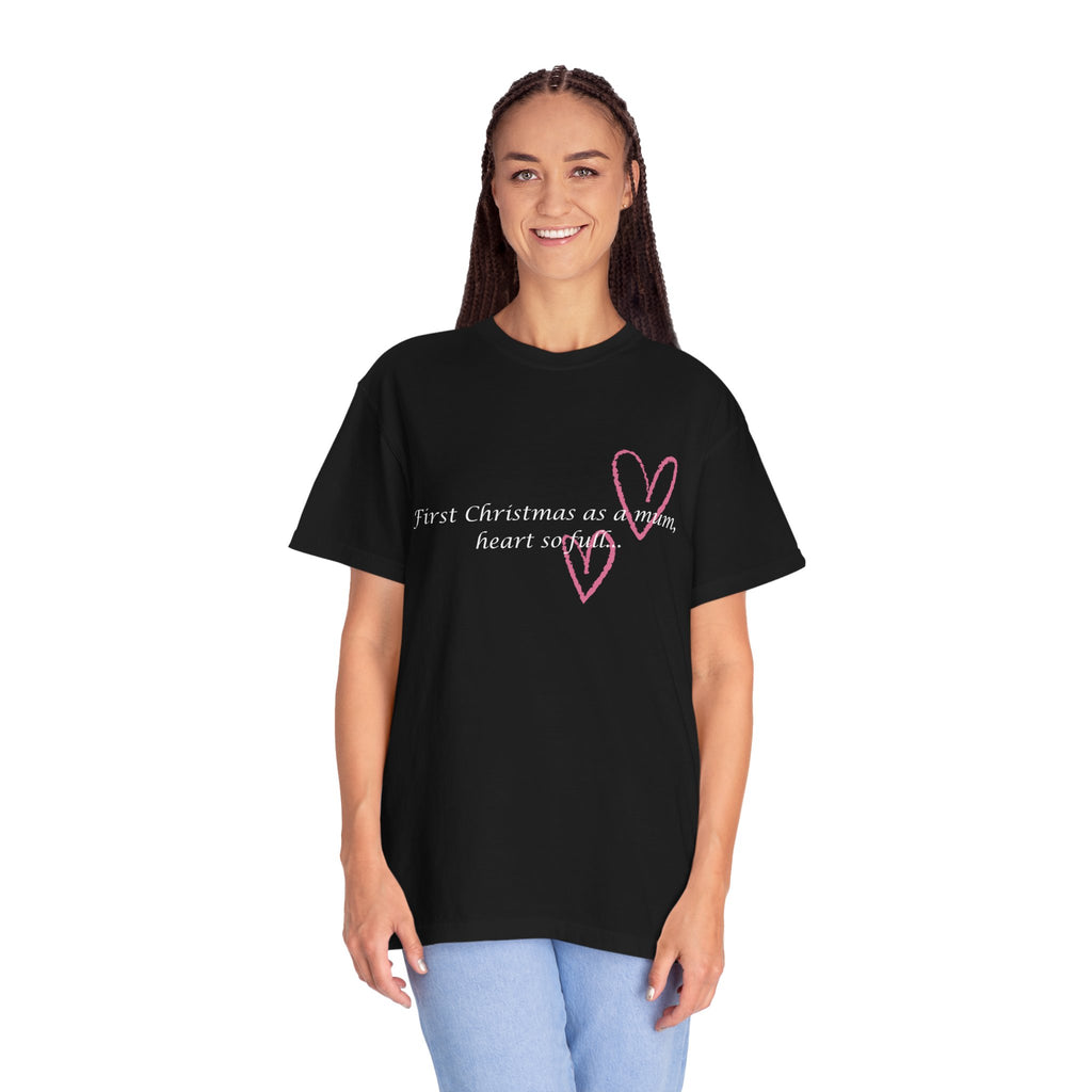 Black Christmas mum heart T-shirt on model with pink heart graphic and “First Christmas as a mum”