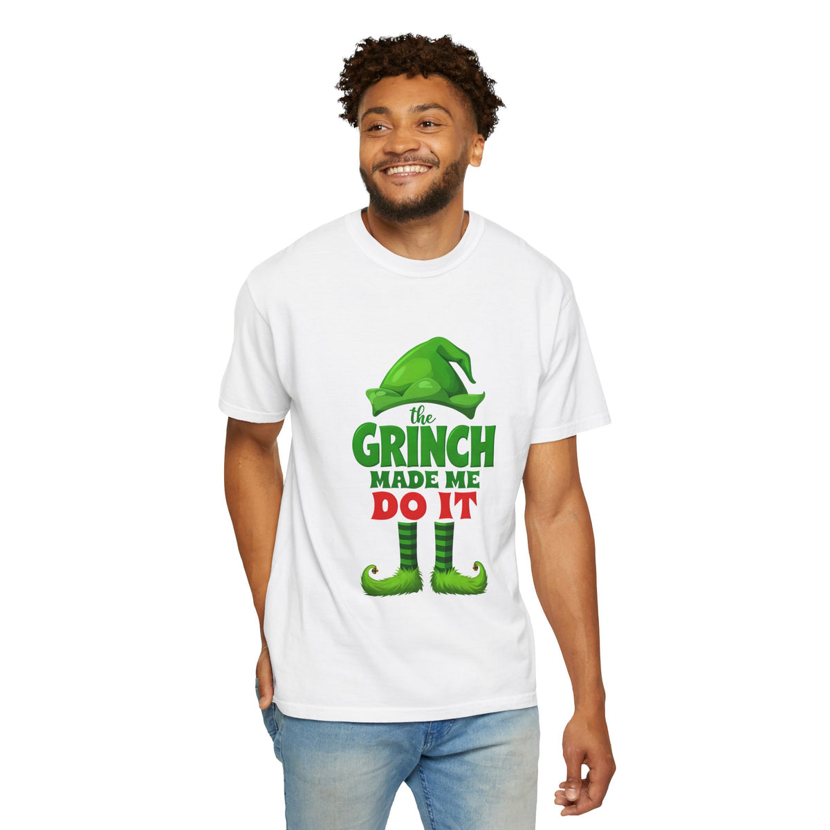 White unisex graphic T-shirt on model with green Grinch “the GRINCH made me do it” print