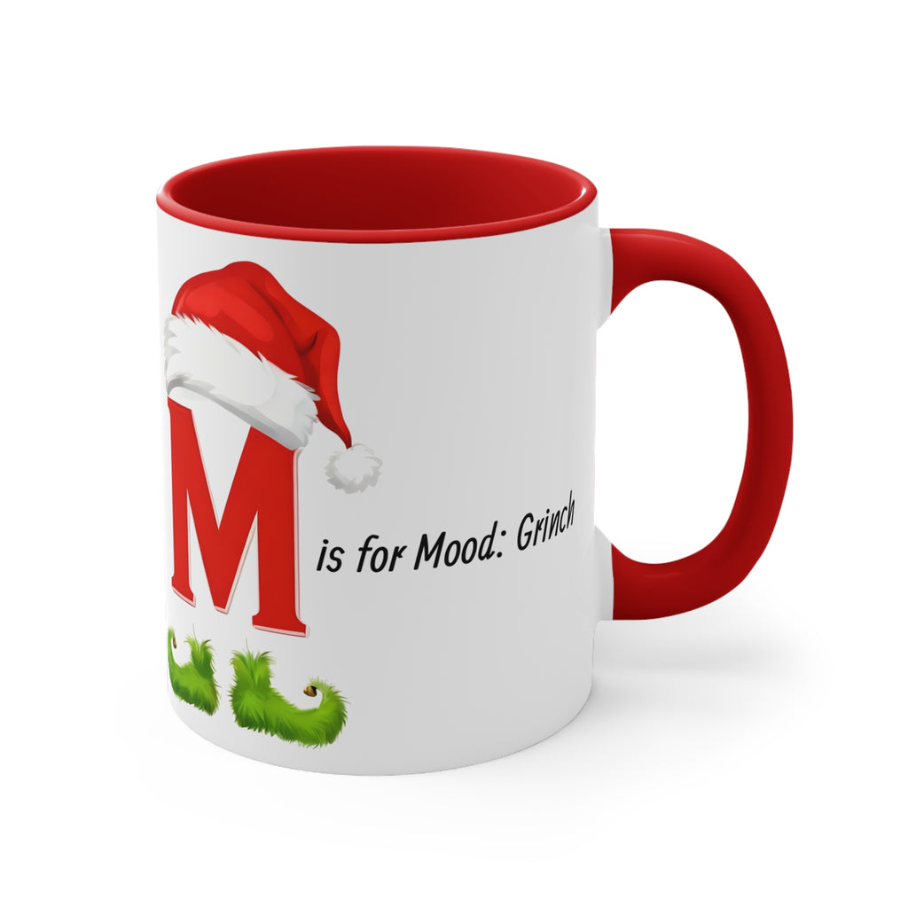 White ceramic letter M mug with red interior and handle; letter M holiday graphic