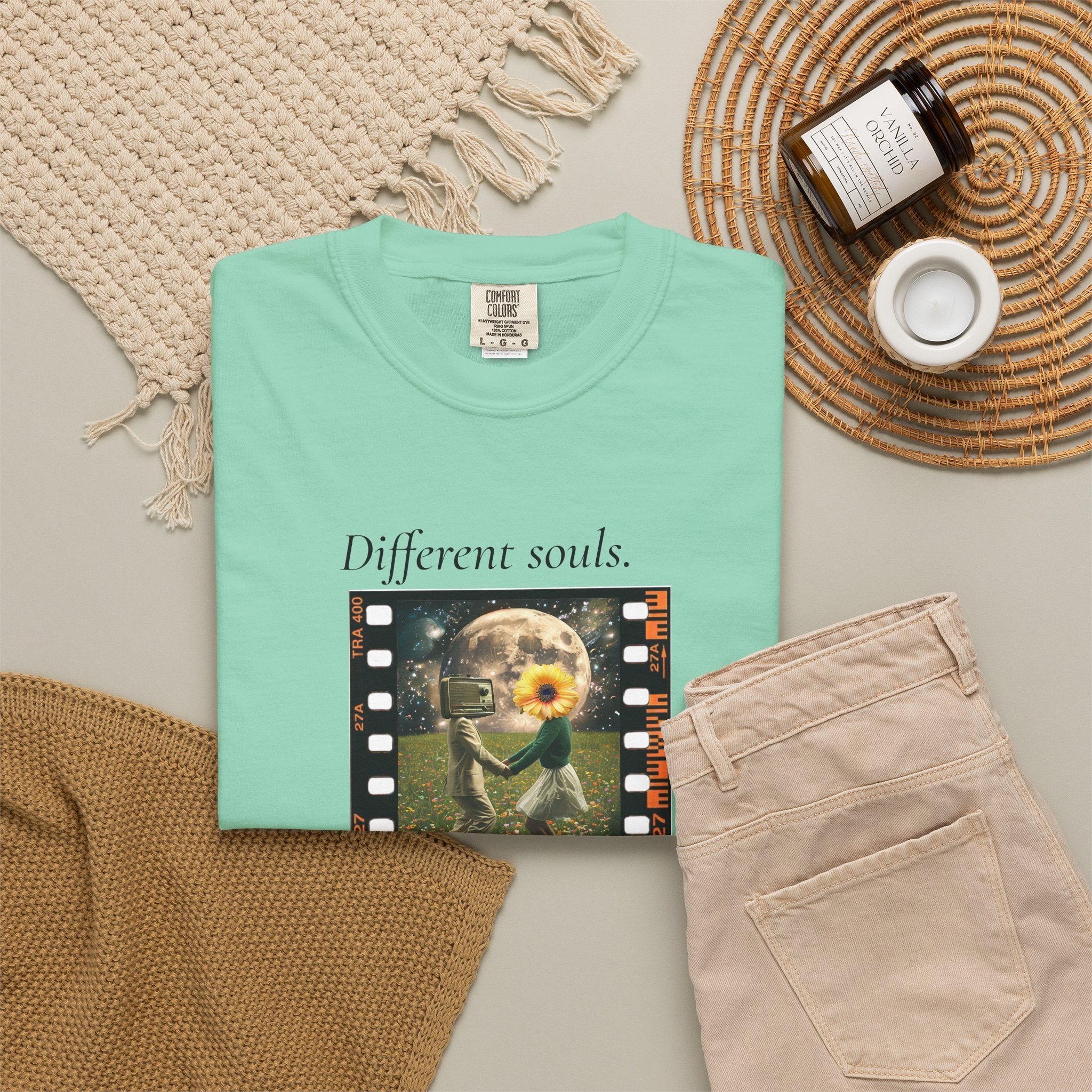 Mint green crew-neck graphic t-shirt with film-style “Different souls” print