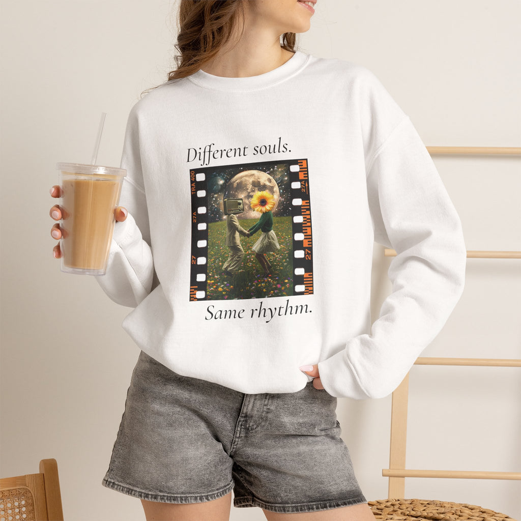 White crewneck sweatshirt with “Different souls.” and “Same rhythm.” graphic