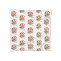 Floral bouquet poly scarf in white with coral, green and gold blooms, printed edge.