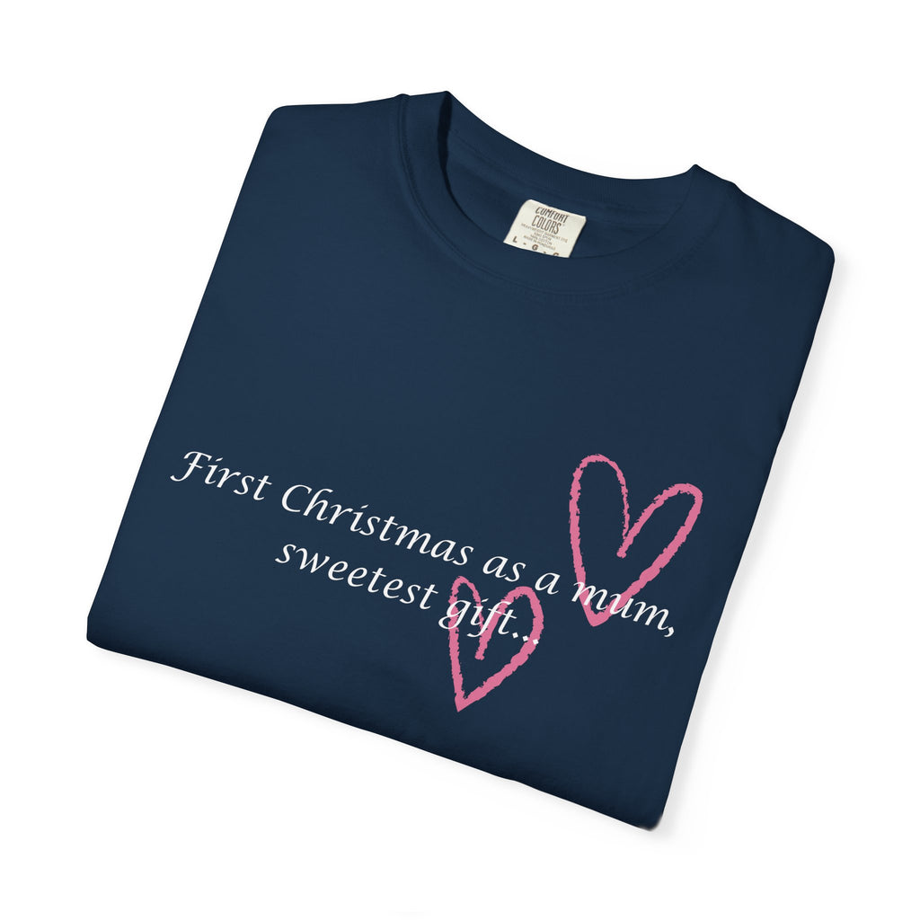 Folded navy crew-neck T-shirt with pink 'First Christmas as a mum' text and heart