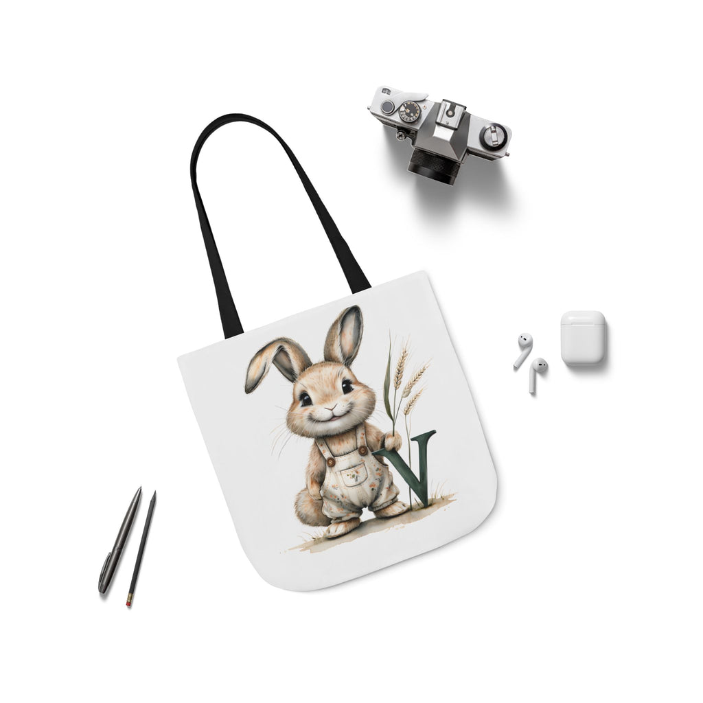 Canvas tote bag with rabbit graphic on white front and black shoulder straps