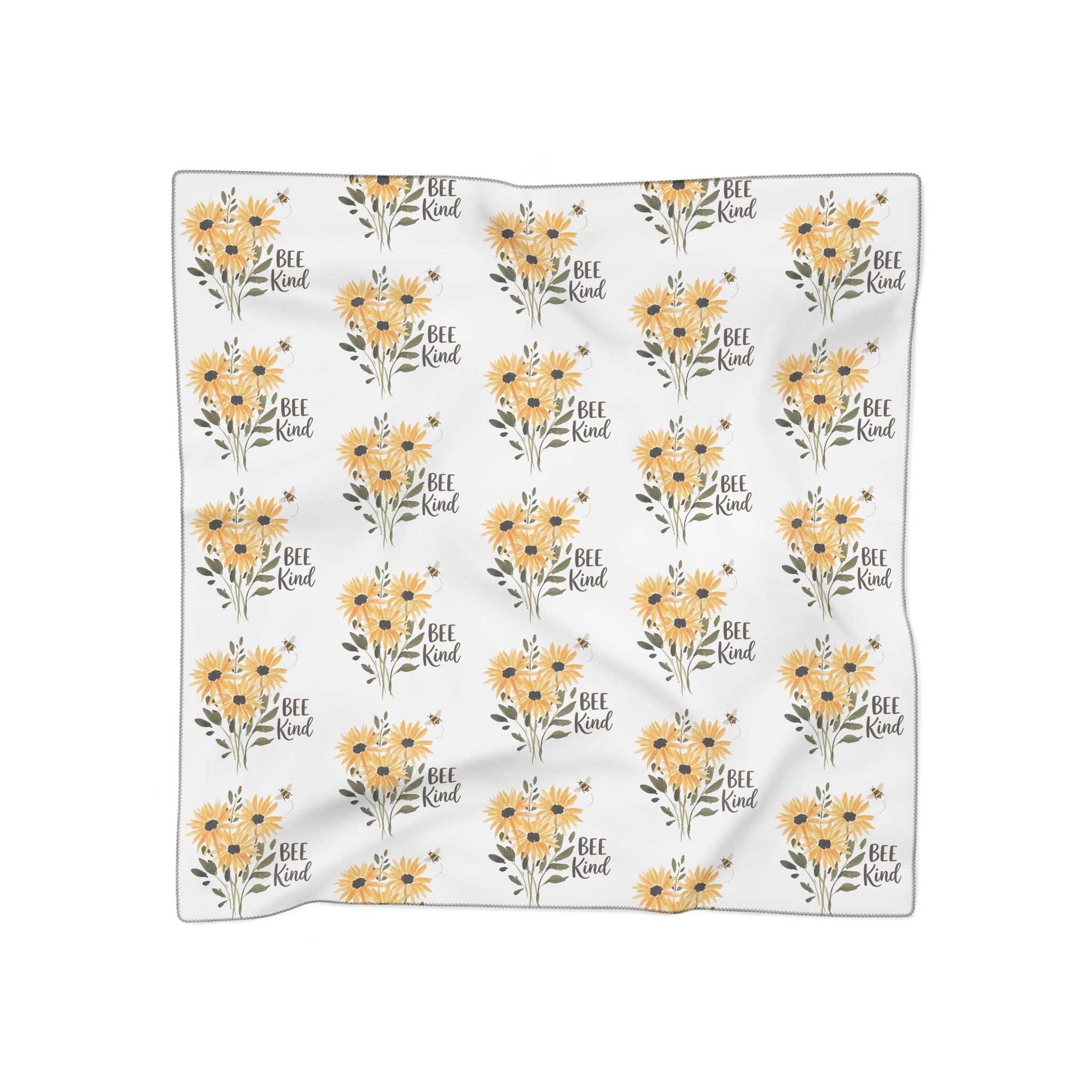 Yellow sunflower floral scarf with 'Bee Kind' text, poly chiffon, folded view