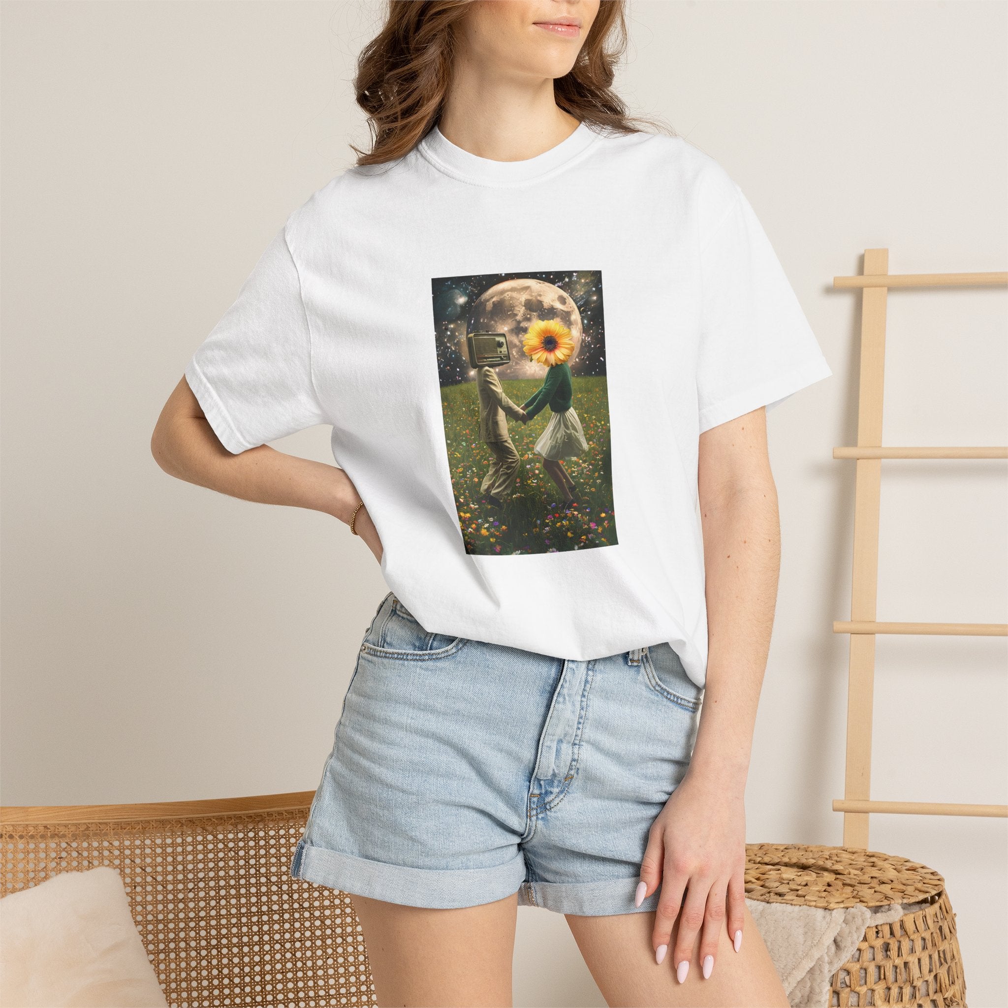 White women's tee with square nature graphic: moon, small figure, and sunflower