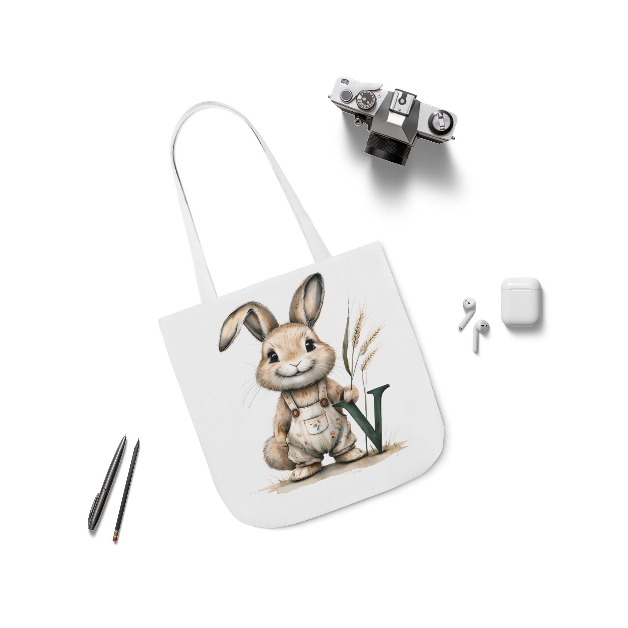 Canvas tote bag with bunny V graphic and white shoulder strap