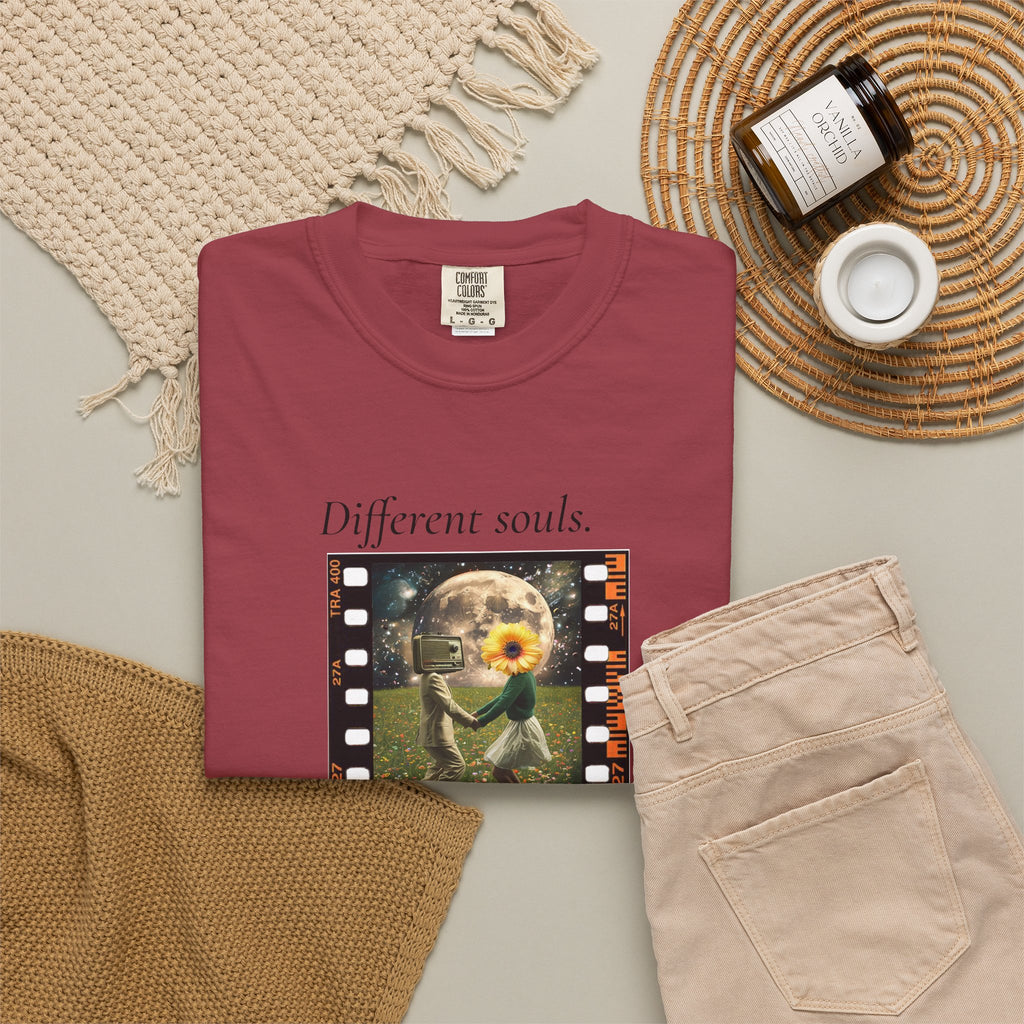 Burgundy crewneck T-shirt with filmstrip-style “Different souls” graphic on front