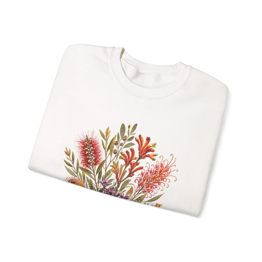 White crewneck sweatshirt with colorful floral bouquet graphic on the chest.