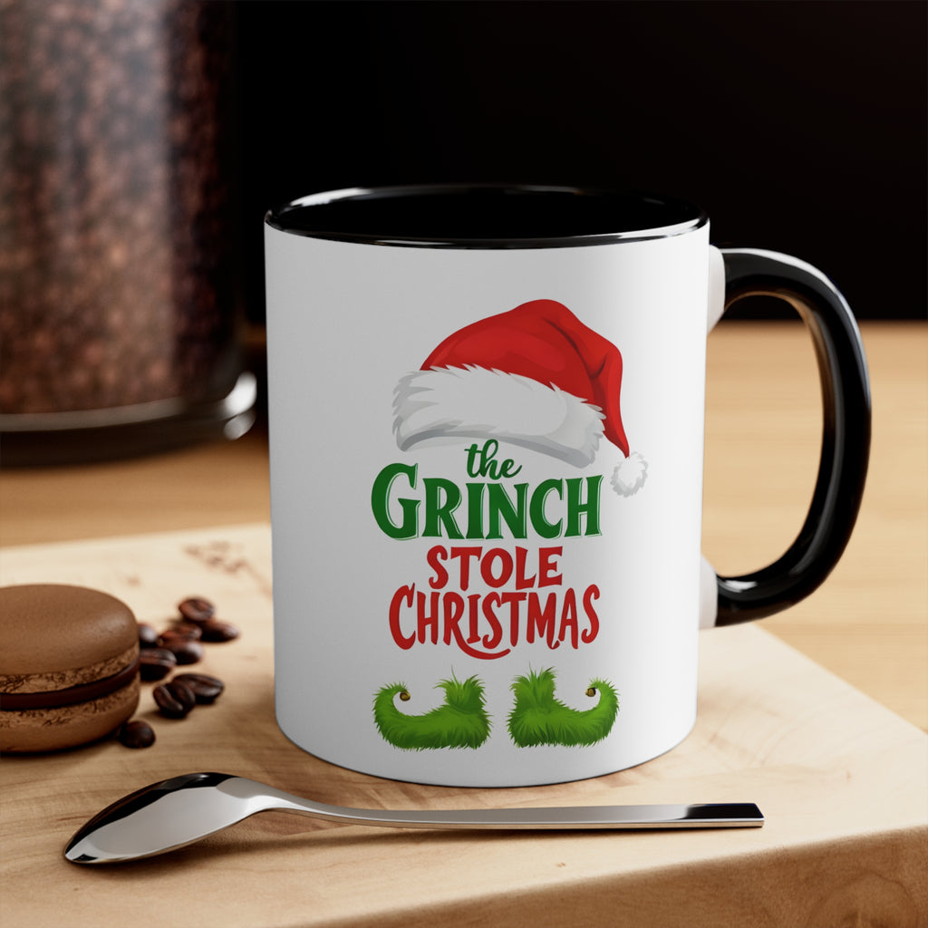 Black interior accent mug with white body, black handle, and Grinch holiday graphic