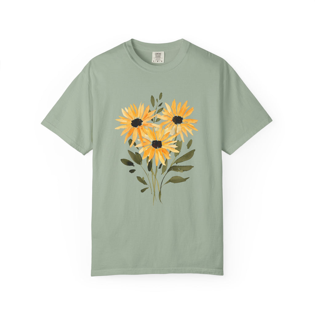 Light green t-shirt with sunflower bouquet graphic in orange, yellow, and dark accents