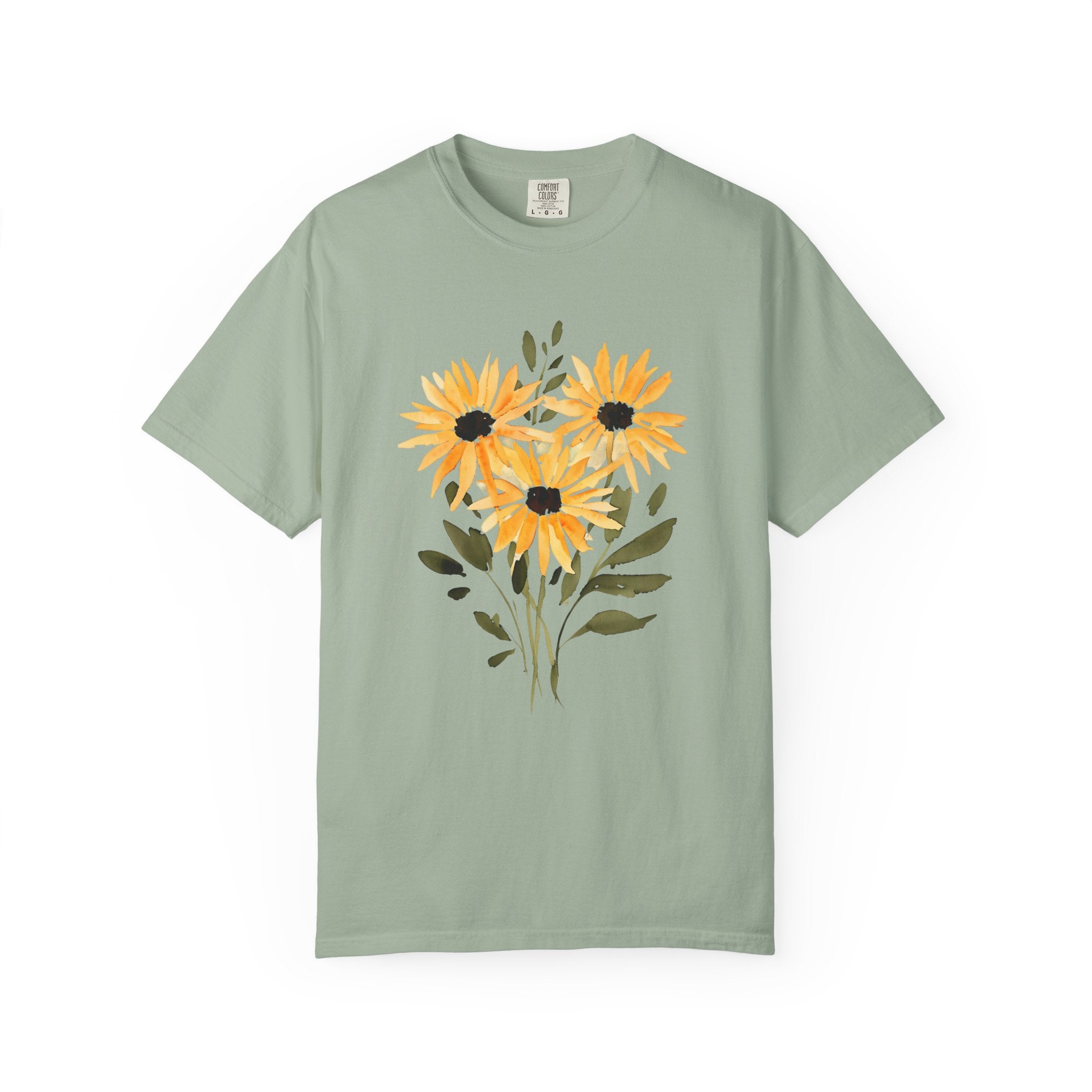 Light green t-shirt with sunflower bouquet graphic in orange, yellow, and dark accents