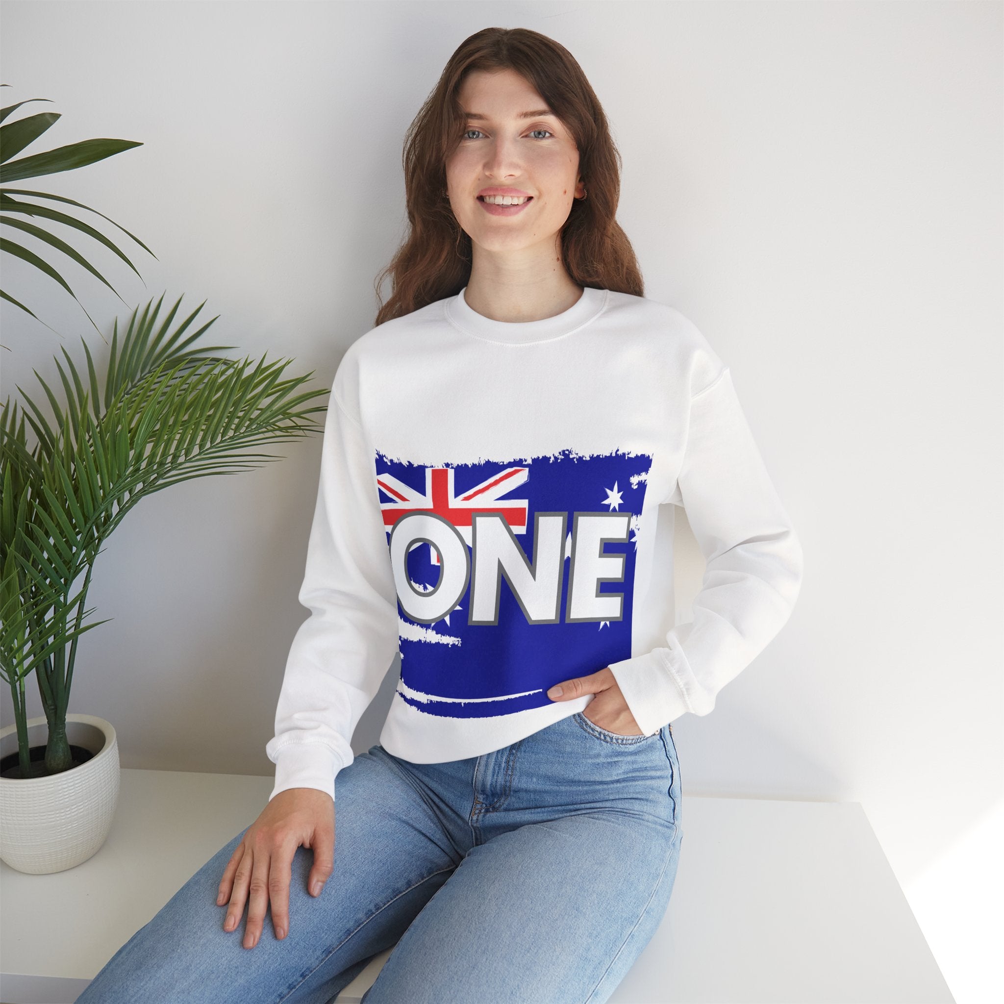 White crewneck sweatshirt with blue "ONE" Aussie flag map graphic