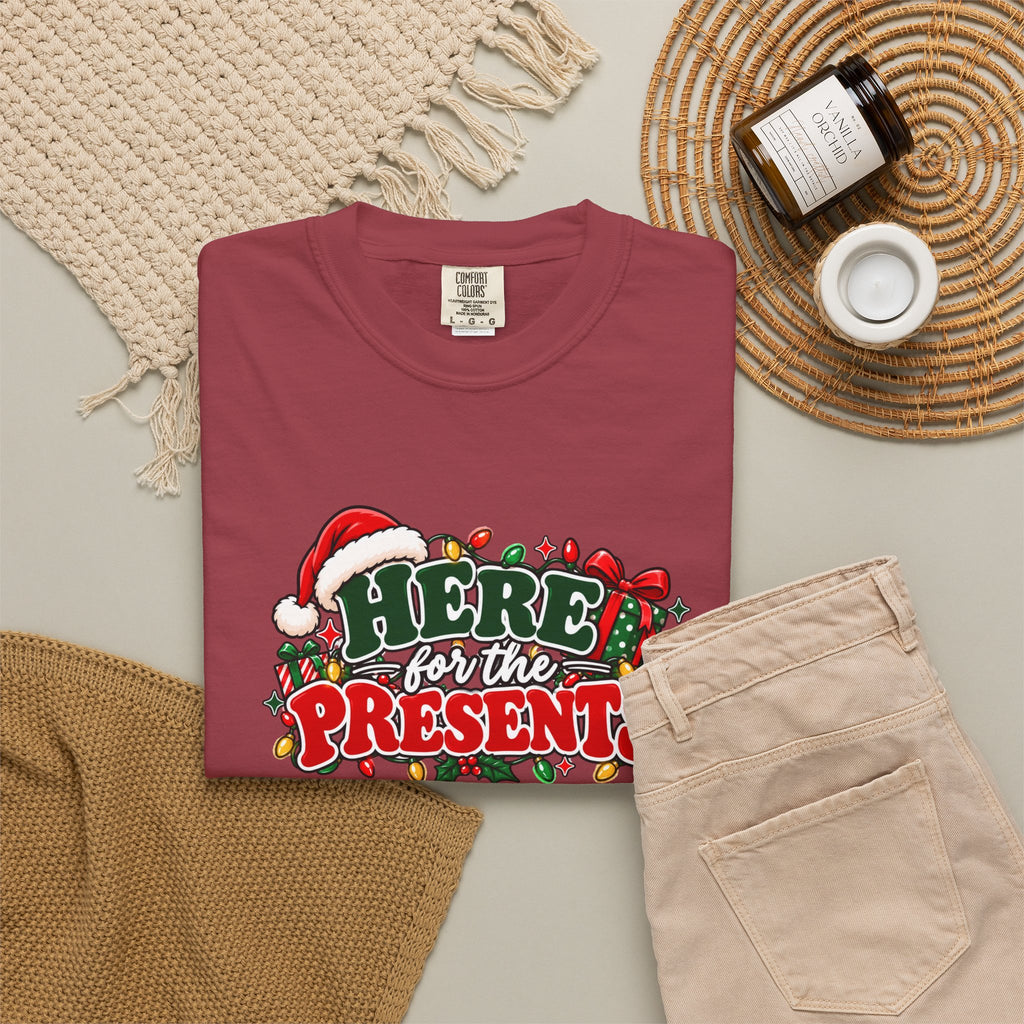 Red graphic Christmas T-shirt front view with “Here for the Presents” design