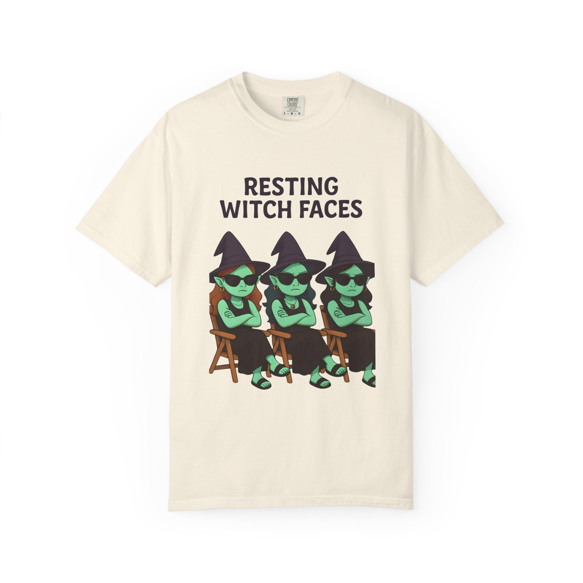 Ivory T-shirt with “RESTING WITCH FACES” text and seated witch faces graphic