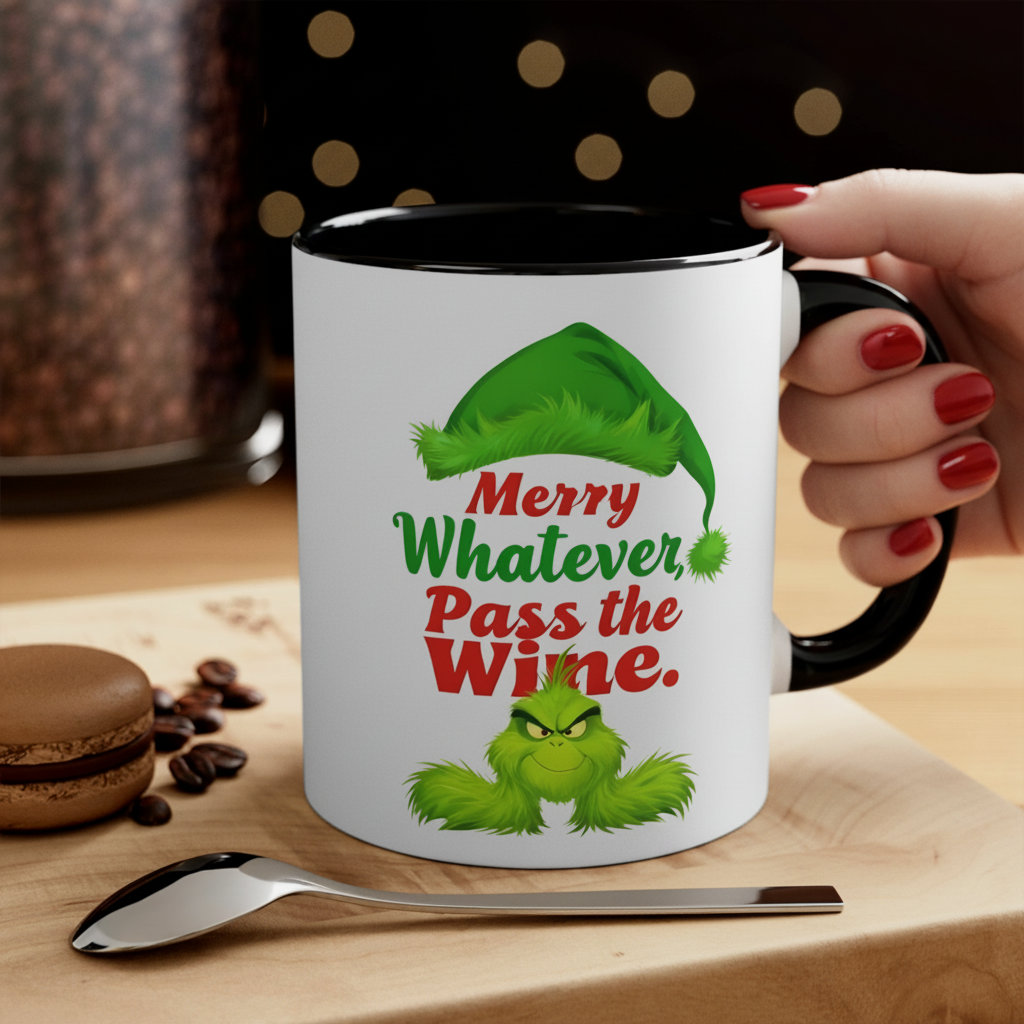 White mug with black rim and handle, green holiday character, 'Merry Whatever Pass the Wine.'