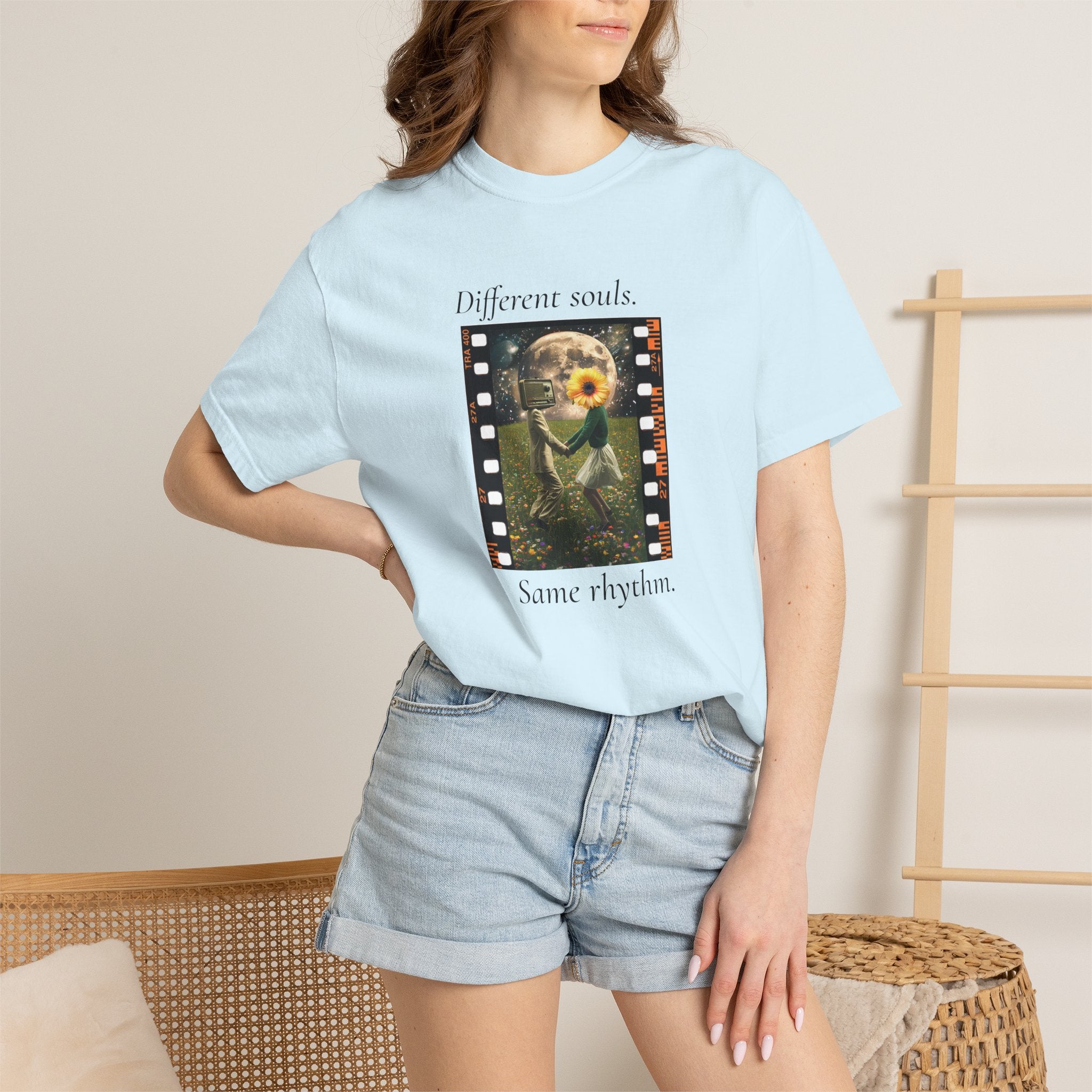 Light blue crew-neck graphic t-shirt worn by model with “Different souls” print