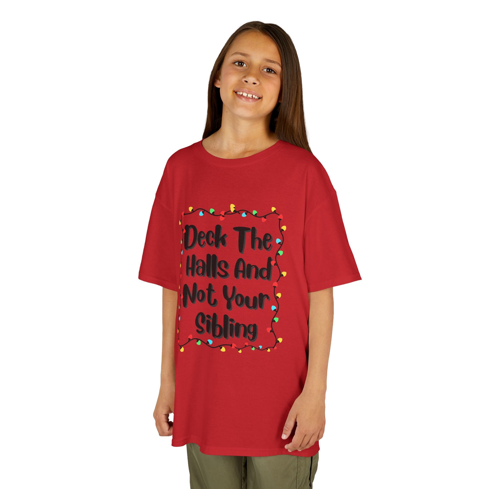 Red kids graphic tee on child, colorful holiday lights slogan design