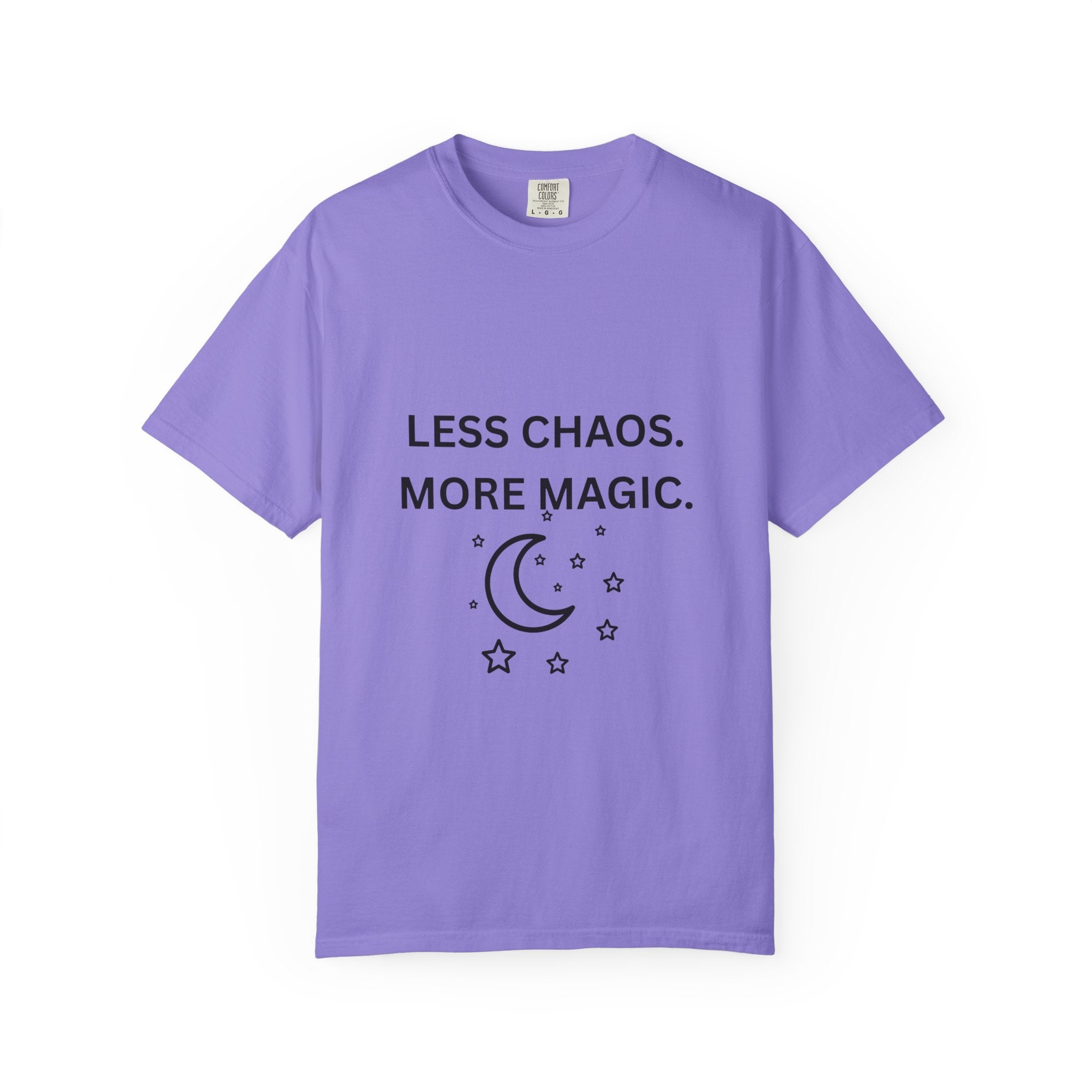 Purple T-shirt with “LESS CHAOS. MORE MAGIC.” moon and stars graphic