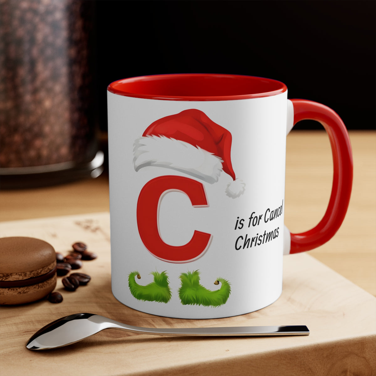 Red-rim mug with large letter C, Santa hat, and 'is for Cancel Christmas' text