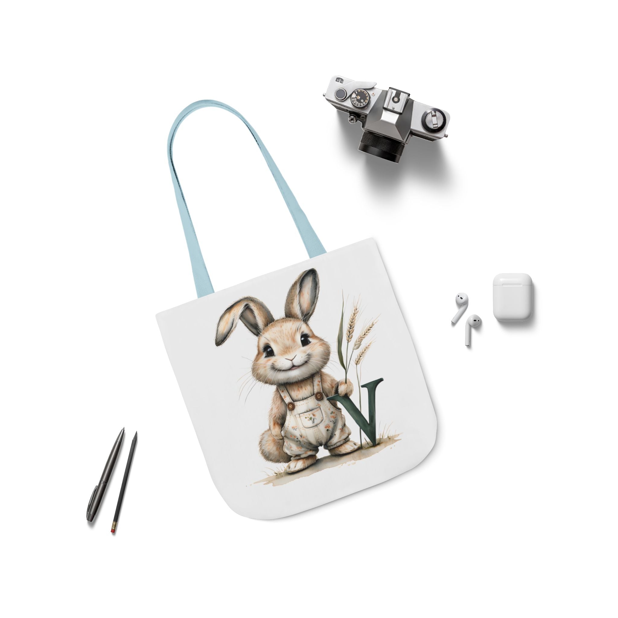 Canvas tote bag with bunny V graphic and light blue shoulder strap