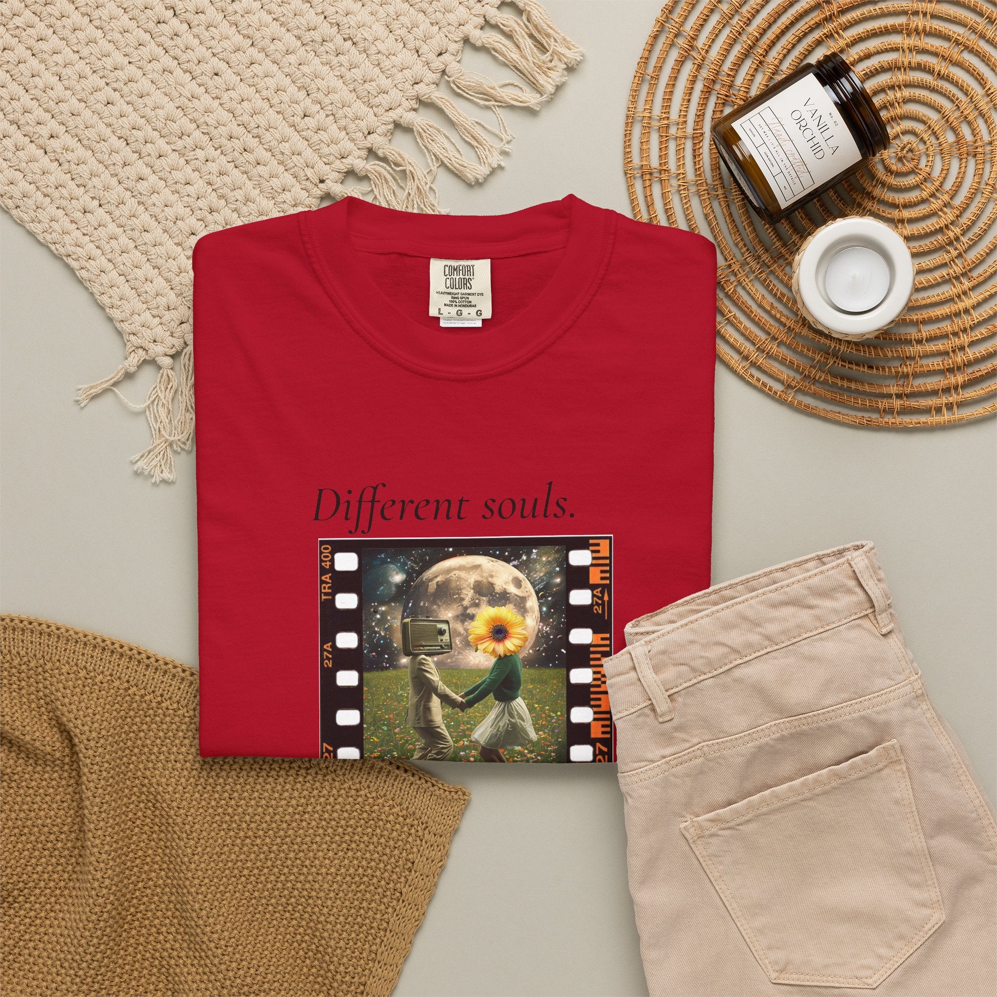 Red crewneck T-shirt with filmstrip-style “Different souls” graphic on front
