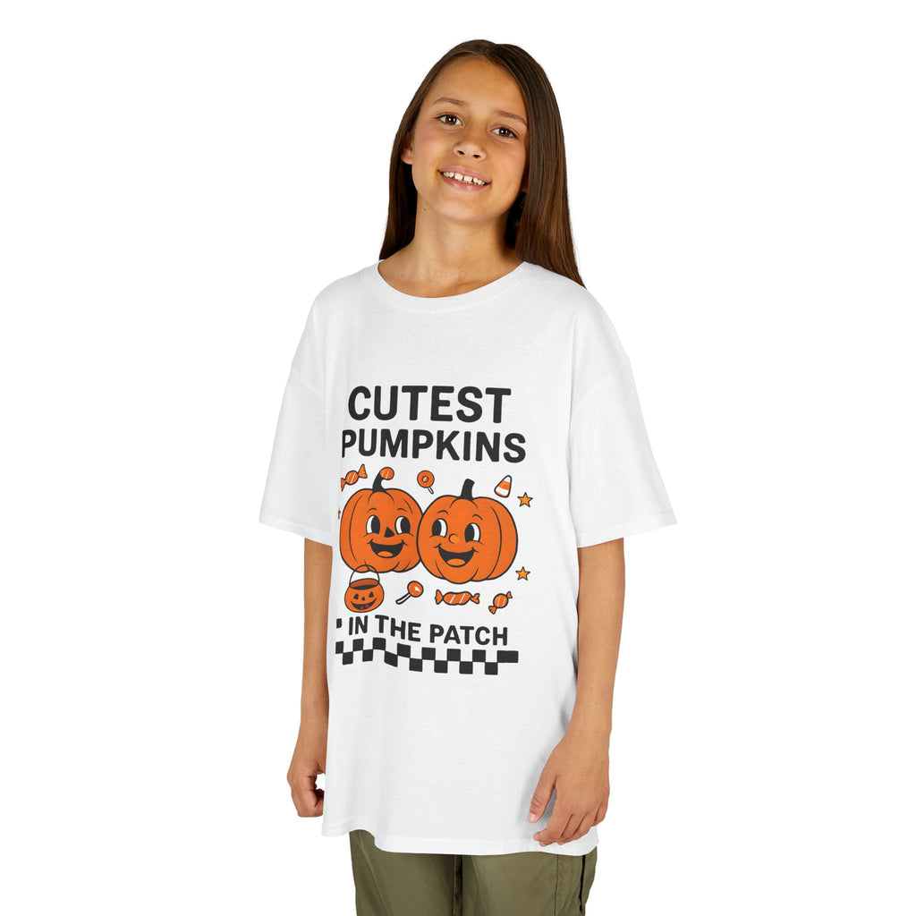 Kids white Halloween tee with orange pumpkin graphic and text 'CUTEST PUMPKINS'