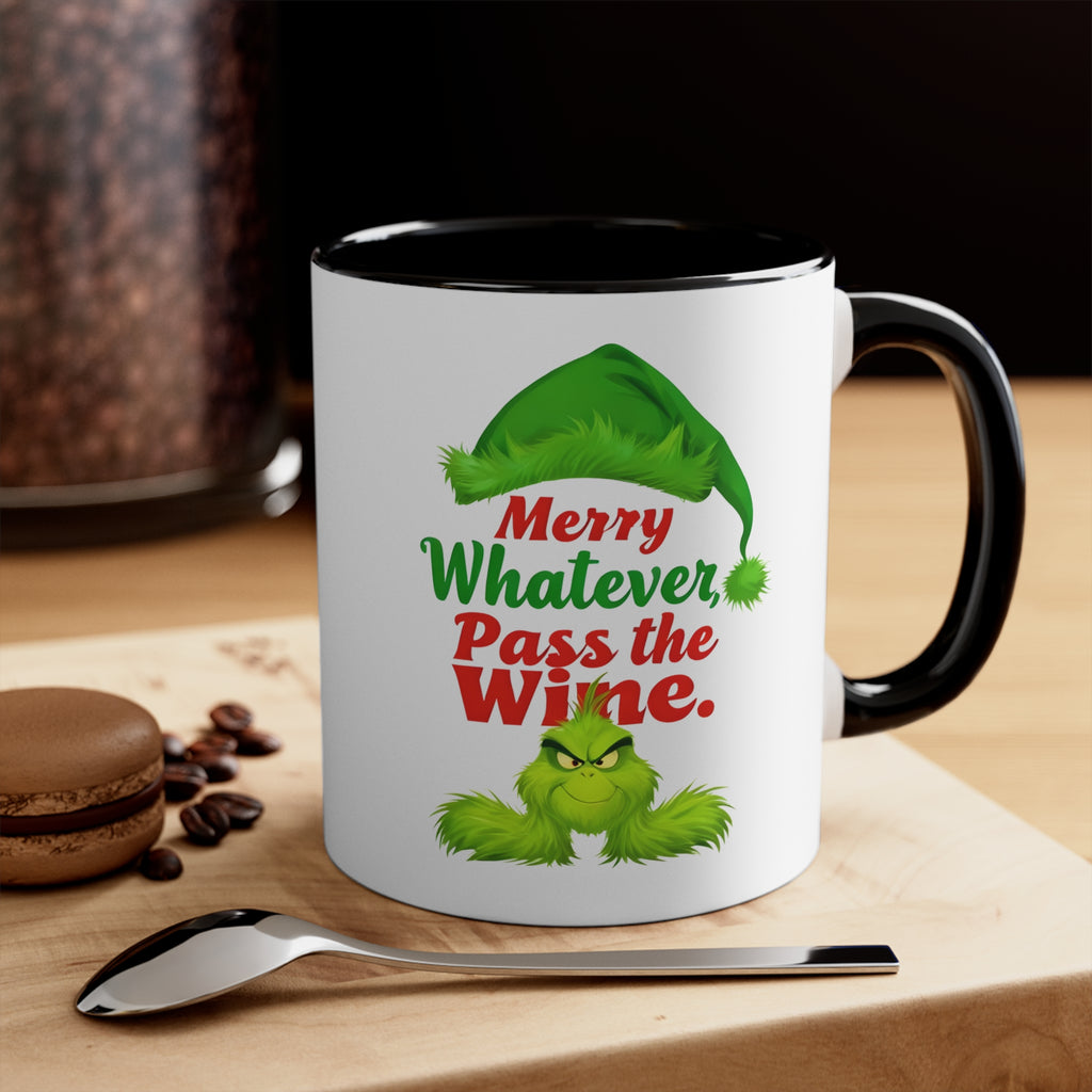 White Christmas mug with black handle/rim, green elf graphic reading “Merry Whatever Pass the Wine.”