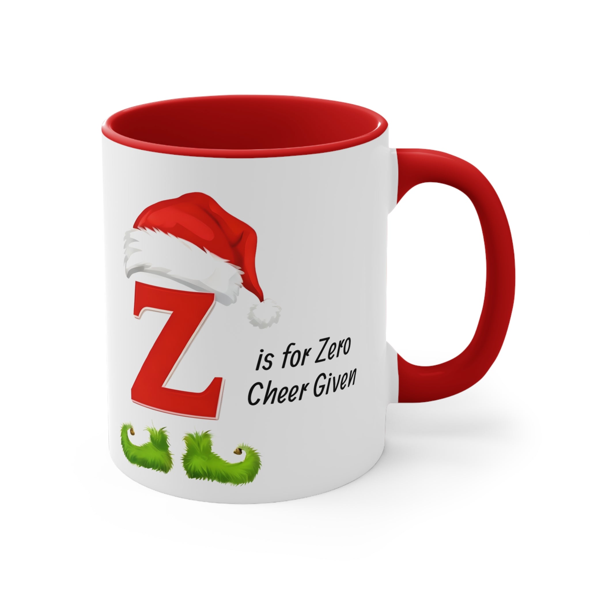 White mug with red handle, letter Z with Santa hat and “is for Zero Cheer Given”