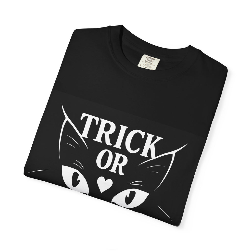 Black Halloween cat t-shirt folded with “TRICK OR CLAW” graphic on front