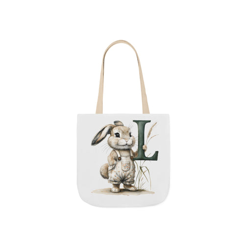 Canvas tote bag with bunny holding letter L, beige handles, front print.