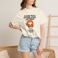 Ivory unisex graphic tee with Halloween text and jack-o-lantern skull illustration