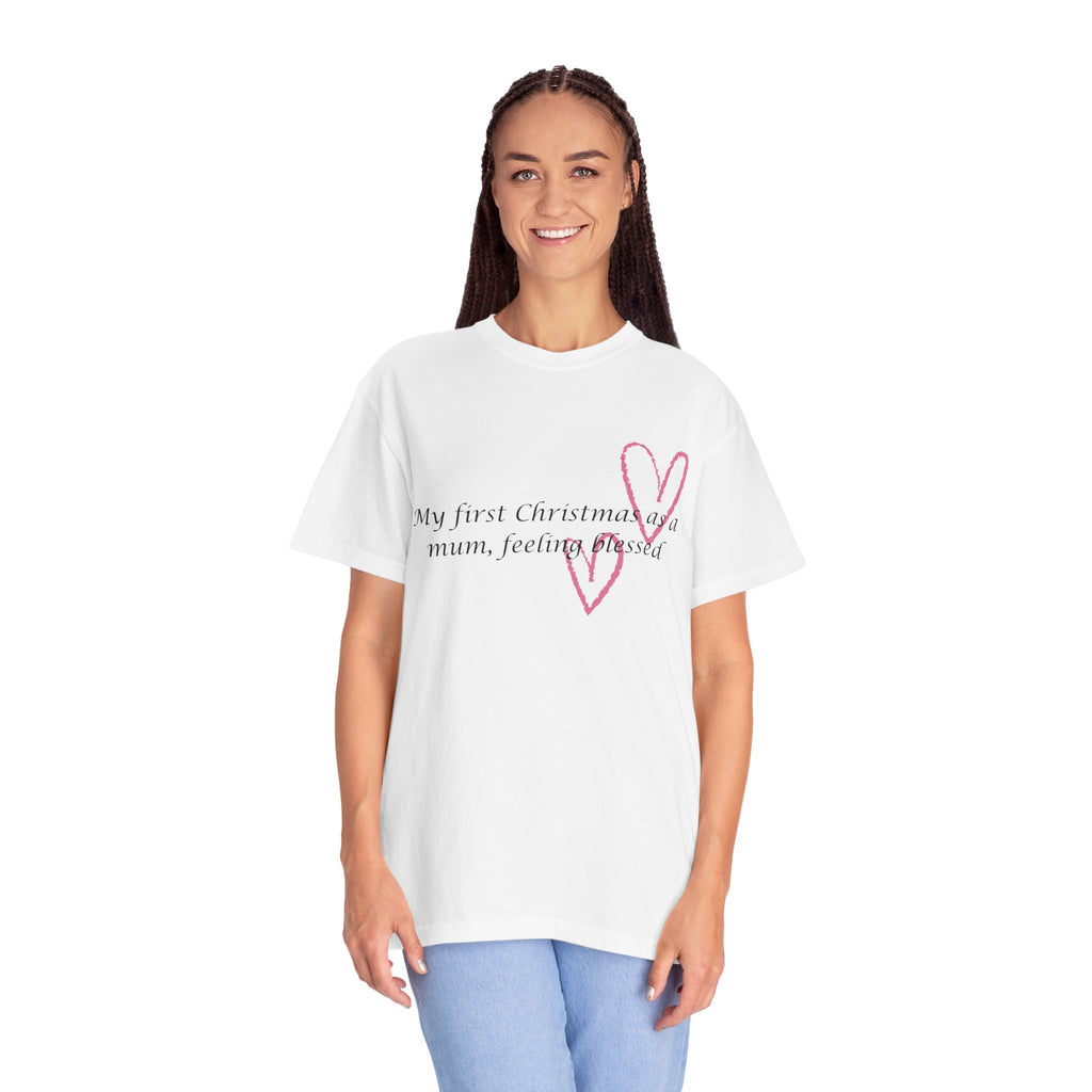 White Christmas mum t-shirt on model with pink heart graphic and “My first Christmas” text