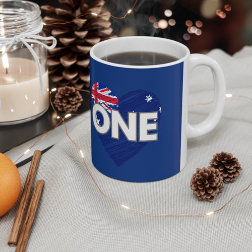 Blue ceramic coffee mug with white handle and interior, 'ONE' heart graphic and Australian flag