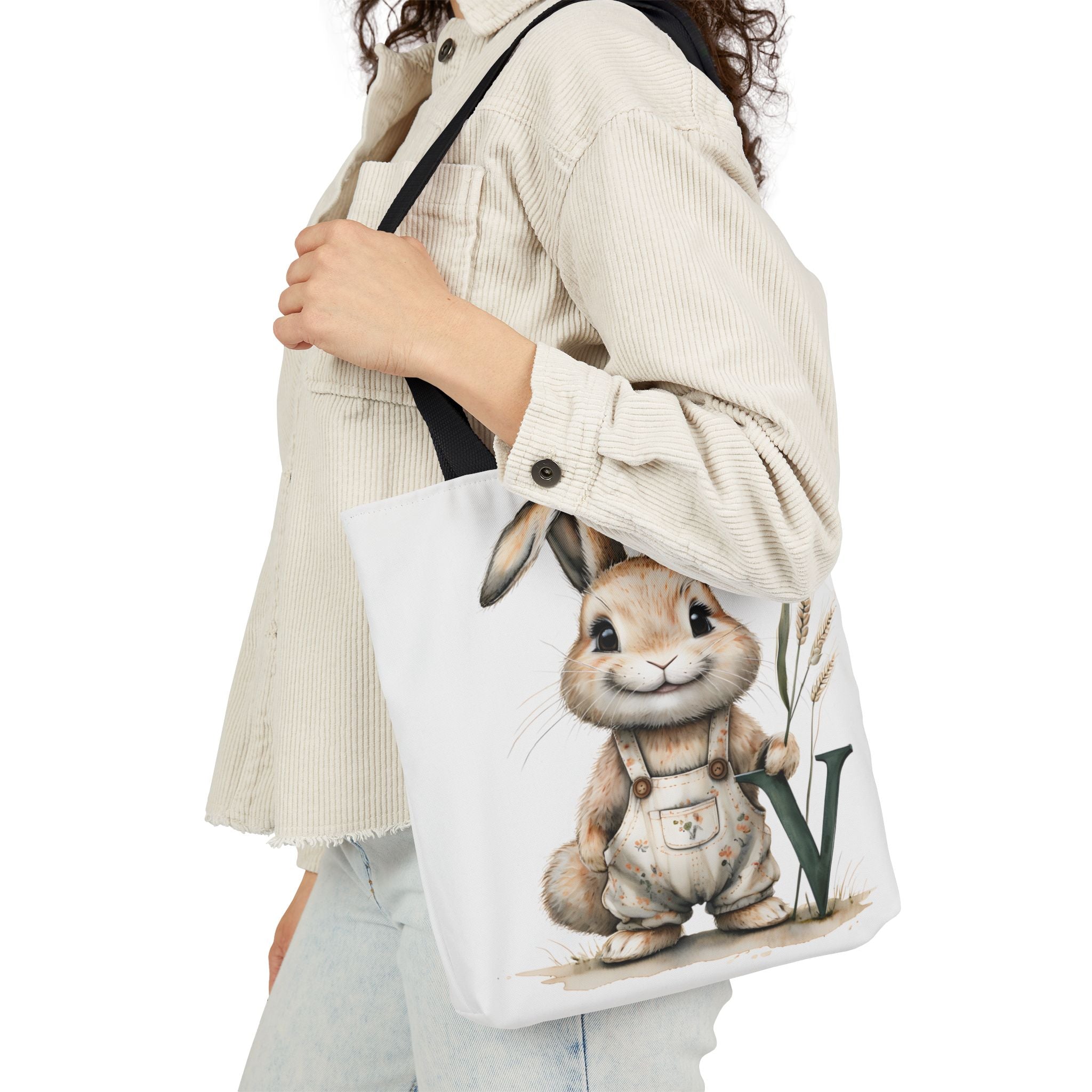 Canvas tote bag with bunny V graphic and black shoulder strap