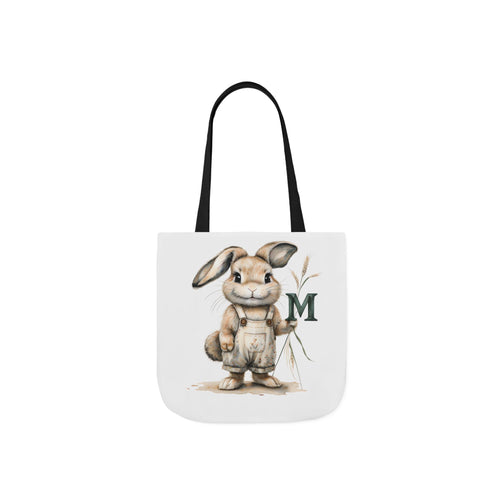 Canvas tote bag with rabbit and letter M, black handles, off-white bag.
