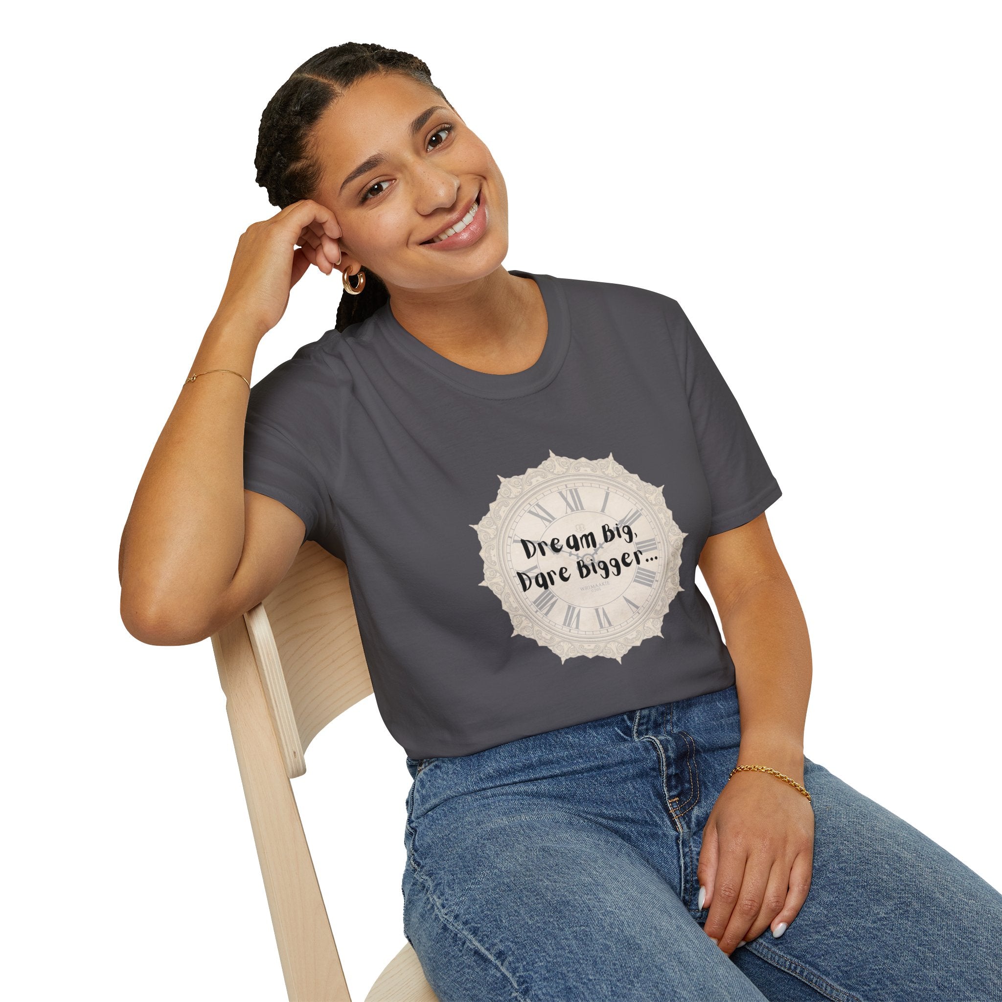 Dark gray T-shirt with cream clock graphic and 'Dream big' quote, worn by model.