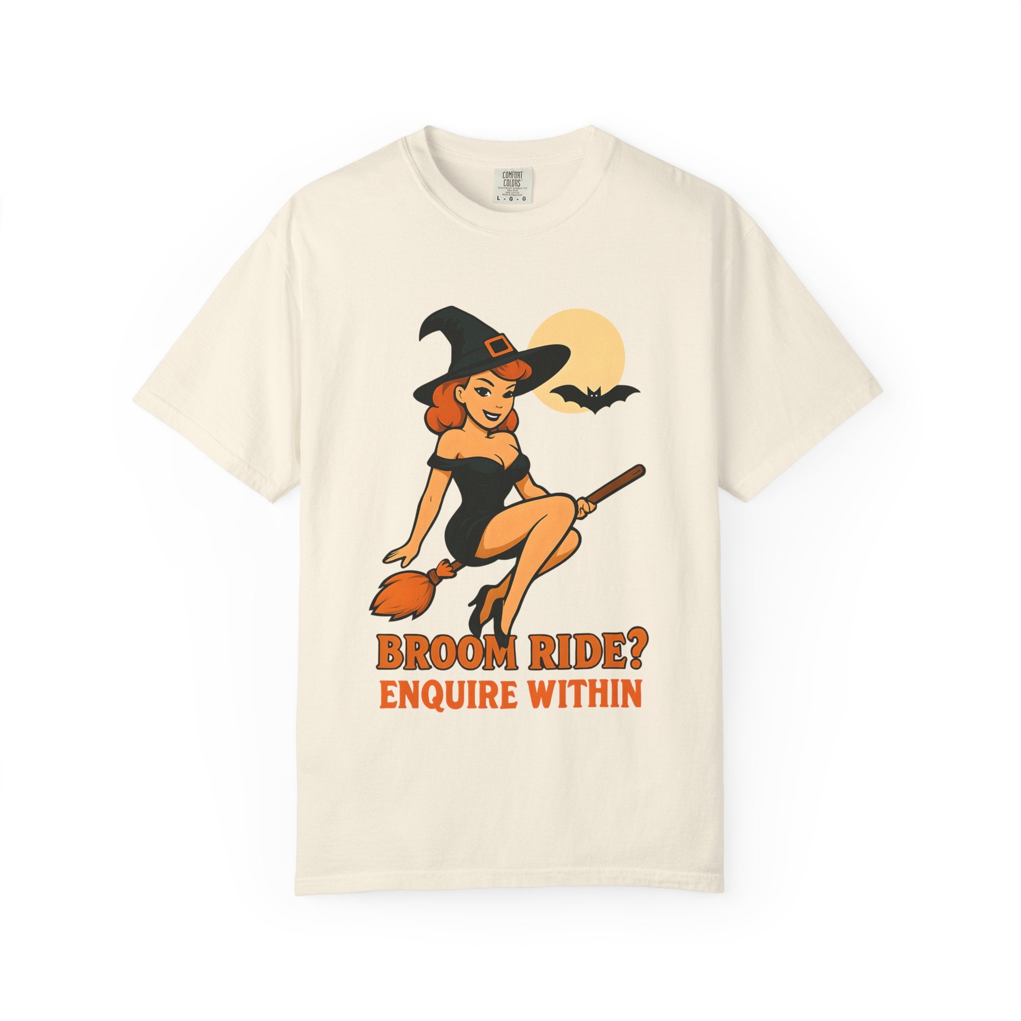 Ivory witch pinup tee with broom ride graphic and orange text on the front
