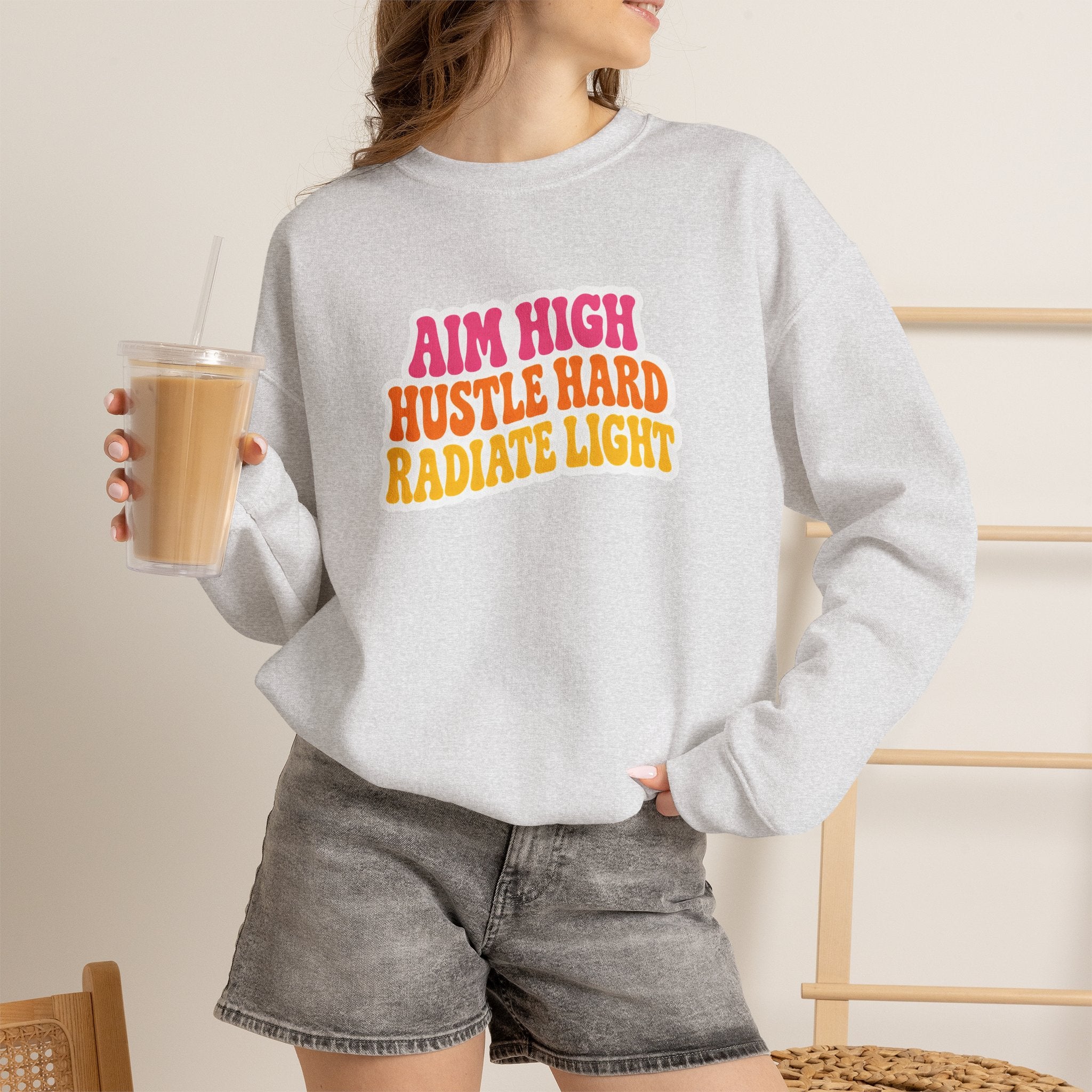 Aim High, Hustle Hard, Radiate Light Unisex Heavy Blend Crewneck Sweatshirt