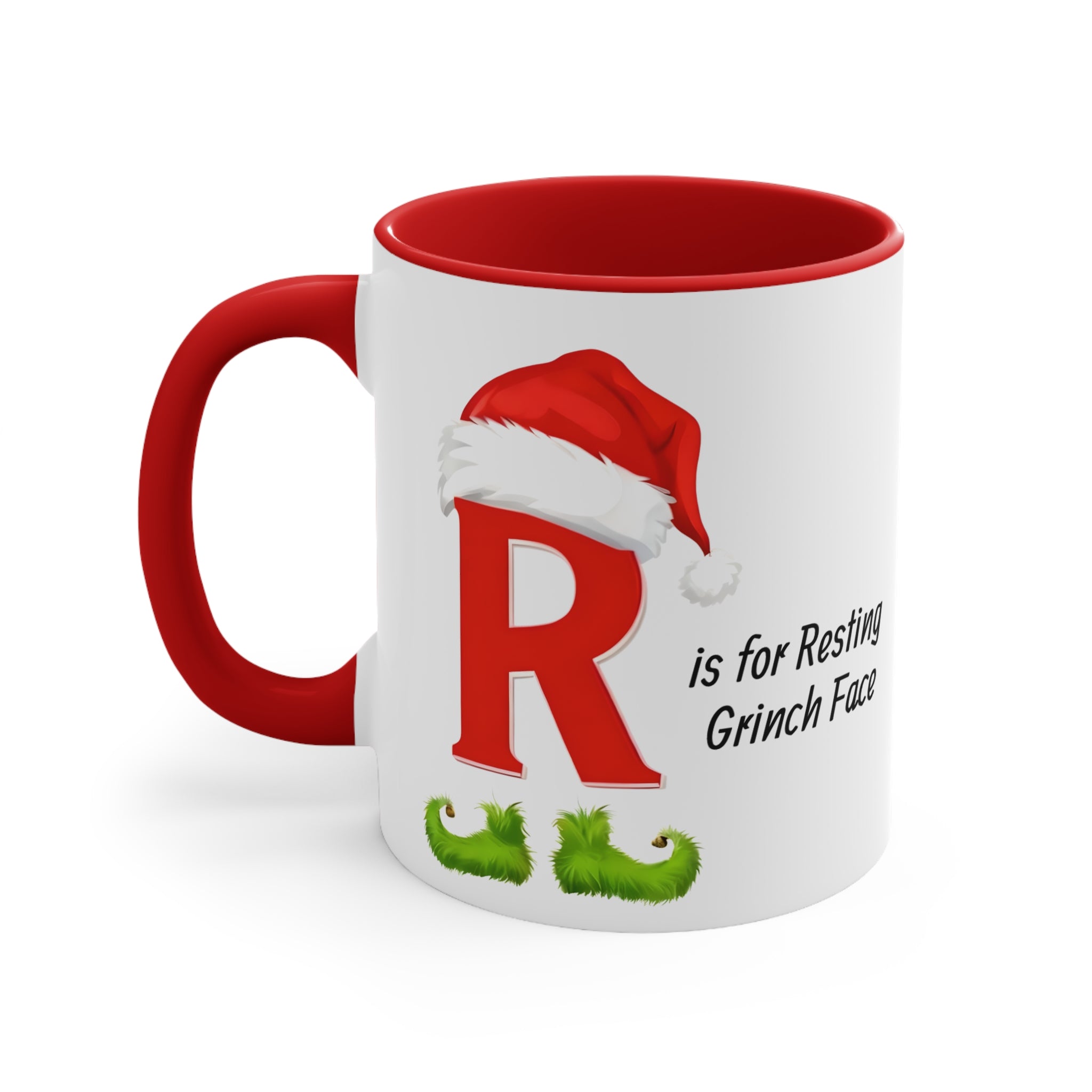 Red-handle white mug with letter R and resting Grinch face holiday graphic