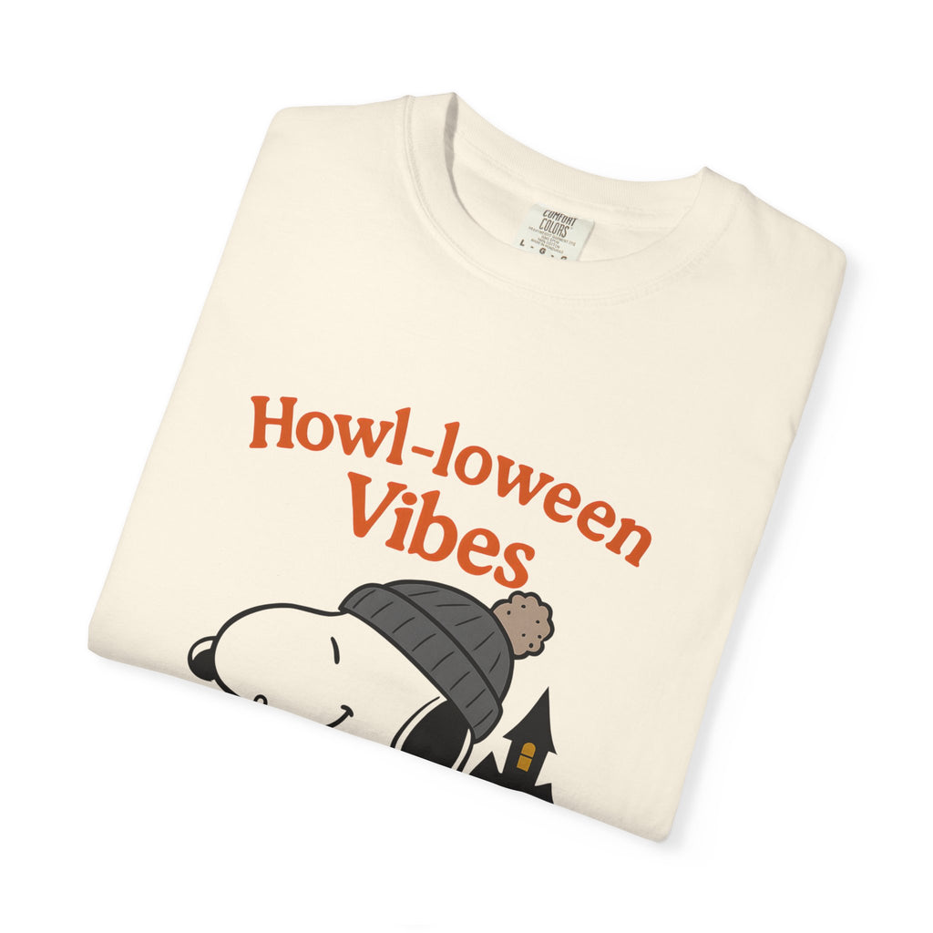 Ivory dog Halloween graphic t-shirt, folded front with “Howl-oween Vibes” print