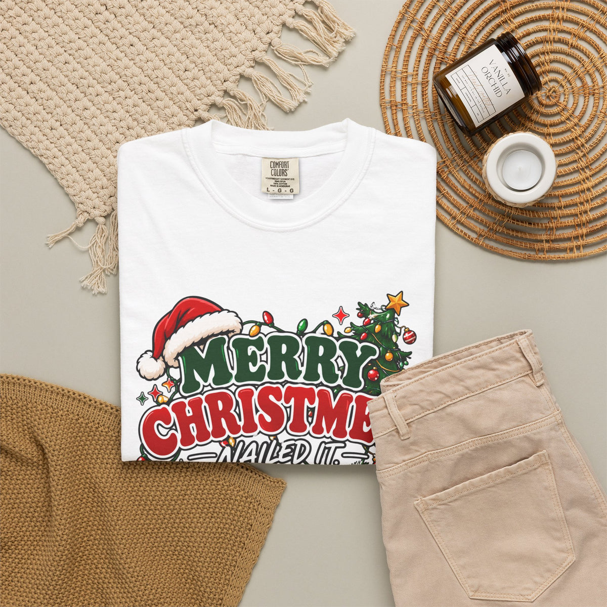 White crewneck Christmas t-shirt with 'Merry Christmas Nailed It' front graphic